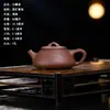 Agente de distribución una generación de olla de arcilla púrpura Yixing al por mayor mineral crudo arcilla púrpura cucharón de piedra pequeño hecho a mano olla tetera doméstica