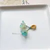 Precio mayorista directo de fábrica pulsera hecha a mano pulsera con colgante diy accesorios pequeños deslizantes colgante de garra de gato lindo Joker
