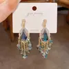 Pendientes de Borla de Gota de Agua con Cuentas de Cristal Aguja de Plata Pendientes Retro de Lujo Ligero de Gama Alta Moda Temperamento Versátiles Pendientes Venta al por Mayor