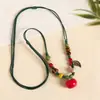 Collar con colgante de campana de mariposa de cerámica de estilo étnico retro para mujer, diseño nuevo y moderno, cadena larga para suéter, accesorios