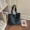 Bolsa de Cuadros Elegante Nueva Otoño 2026 Bolso de Hombro Único para Mujer Color Sólido Casual Estilo Perezoso Bolso de Mano para Viaje