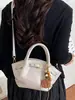 Bolso de Color Sólido Simple 2026 Verano Nueva Llegada Diseño de Nicho Sensación Relajada Personalidad Viaje al Trabajo Bolso de Hombro Cruzado