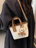 Comercio exterior este año explosiones populares bolso de cubo para mujer 2024 nueva moda versátil bolso de hombro portátil nicho bolso bandolera