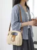 Bolso de nicho transfronterizo para mujer, nuevo bolso de moda tejido de paja 2026, bolso de hombro y cruzado para vacaciones en la playa