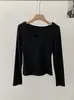 Camiseta Omalai Puro Deseo Chica Sexy Hueca de Manga Larga para Mujer Primavera Temprana 2026 con Hombros Acolchados Cuello Redondo Top Tendencia 6245