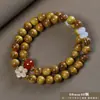 Pulseira de contas de oração budista de madeira crua natural, vendida a quente, sândalo dourado, sândalo Barbie, pulseira colecionável para homens e mulheres, fornecimento para live-stream