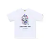 Comercio exterior mayorista transfronterizo estilo japonés moderno estampado de camuflaje cabeza de tiburón cabeza de tigre mono bloques de color luminoso para pareja camiseta holgada morada