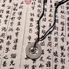 Collar con hebilla de paz y campana pequeña para mujer, estilo antiguo, diseño de nicho, collar con anillo de jade de la paz tejido de estilo nacional para hombres y mujeres.