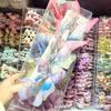Nuevo Estilo Pequeño Perla Degradado Gasa Alas Flotantes Mariposa Pinza para el Cabello Celebridad de Internet Niña Flequillo Clip Lateral Pasador Venta al por Mayor