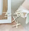 Suministro directo de fábrica encaje un punto moño pequeño calcetines para ropa interior accesorios pequeños accesorios para ropa accesorios moño venta al por mayor