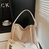 Bolsa Feminina de Nicho de Alto Padrão Transfronteiriça Nova Moda Primavera 2026 Bolsa Transversal Diária Bolsa Tote Versátil de Grande Capacidade
