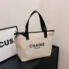 Moda Transfronteiriça Versátil Bolsa de Cosméticos Portátil para Saída Simples Bolsa de Mão Feminina Grande Capacidade Europeia e Americana Pequena Fragrância Necessaire