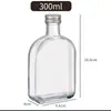 Garrafa transparente para bebidas com ombro inclinado de grau alimentício, garrafa de vidro para vinho de frutas selada, garrafa de café, garrafa vazia engarrafada, garrafa de chá com leite, atacado