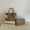 Bolso de Mano Estilo Coreano Retro de Gran Capacidad, Estético y de Alto Valor, con un Ambiente Relajado, Nuevo Modelo Primavera 2026, Bolso Cubo de Hombro Cruzado
