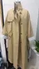Trench coat feminino transfronteiriço outono casual para trabalhar, bicolor, com lapela, de abotoamento duplo, corte solto e fenda