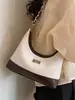 Bolso de mano pequeño de moda para mujer, nuevo bolso de cadena popular primavera-verano 2026, exquisito bolso de hombro y cruzado