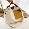 Bolsa de Lona com Costura Contrastante de Design Exclusivo Bolsa de Mão Casual Personalizada Bolsa de Ombro Transversal para Estudante de Grande Capacidade