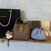 Bolsa de Hombro para Mujer Estilo Nuevo Primavera 2026 Bolso Cruzado Versátil Bolso Cubo Versátil Bolso Cruzado de Moda