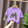 Camiseta base para niño 2026 nuevo modelo camiseta de manga larga a rayas patchwork para niños top de algodón puro otoño para niños mayores