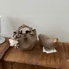Bolsa de mão texturizada, plissada, com design nicho e tema florestal para mulheres, versátil, artística, bolsa de ombro, bolsa transversal, bolsa pequena retrô e fashion