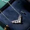 Collar de perlas naturales de luz fuerte para mujer, temperamento elegante, corona en forma de V de pluma de garza, diamante de simulación, colgante de plata S925
