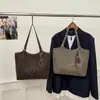 Bolso Tote de Gamuza Texturizada para Mujer 2026 Nuevo Accesorio de Moda Tendencia Gran Capacidad para Hombro y Axila para Clase y Viajes