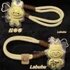 Llavero de Oro Puro Peluche Colgante Dorado Adorno para Teléfono Regalo de Moda Fábrica Mayorista Fabricante de Primera Mano Artículo Popular