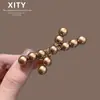 Pinza para el pelo de clip de pico de pato, color oro champán perlado de lujo, para mujer, nuevo estilo japonés y coreano, clip lateral para mechones rebeldes, accesorio para el pelo
