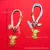 Chaveiro Criativo Personagem Estrela Fofa Desenho Animado Ouro Puro Cordão para Bolsa Diária Nicho Presente de Feriado Atacado Personalizado