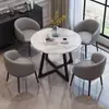Mesa de comedor de piedra sinterizada de lujo ligero, mesa de negociación y juego de sillas, oficina de ventas, balcón, cafetería, tienda de té con leche, apartamento pequeño, mesa y sillas redondas