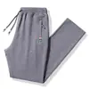 Pantalones deportivos de invierno para niños y adolescentes, pantalones de chándal de color sólido, con forro polar engrosado, para estudiantes de secundaria, casuales, combinables con todo, pantalones de moda para otoño e invierno