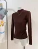 Camiseta Base de Punto con Cuello Alto y Hilo de Mecha para Mujer Otoño e Invierno 2026 Suéter con Cuello Alto y Hombro Normal