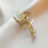 Broche Vintage Tulipán Estilo Francés con Lujosos Diamantes de Imitación y Diseño de Flor Ojo de Gato, un Accesorio Exquisito de Nicho para Abrigos de Mujer