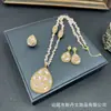 Nuevo juego de joyería de piedra en bruto de cristal con diseño de diamantes completos, cadena para suéter, recursos mayoristas de anillos y pendientes transfronterizos europeos y americanos