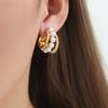 Aretes asimétricos geométricos huecos de concha con pedrería de acero de titanio chapado en oro de 18k que no se desvanecen, aretes de temperamento de nicho para mujer