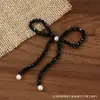 Decoración de lazo de perlas estilo Chanel accesorios hechos a mano con cuentas accesorios para joyería DIY accesorios para funda de teléfono parches 3D