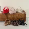 Bolso de lunares para debajo del brazo para mujer, nuevo bolso de mano chic estilo coreano de nicho para el otoño de 2026, bolso de hombro moderno para el trabajo y los desplazamientos