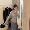 Contiene 33% lana, Guangzhou Trece Líneas imis*2026 Otoño Cuello Polo Adelgazante Manga Larga Top de Punto para Mujer
