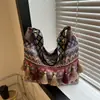 Bolsa Casual com Franjas Estilo Étnico Fashionável de Grande Capacidade 2026 Nova Versátil Bolsa de Ombro Transversal Tote de Lona
