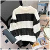 Suéter de punto trenzado a rayas con cuello redondo 2026, estilo holgado y relajado para hombre, tejido de moda con bloques de color, suéter interior para hombre