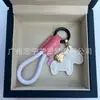 Dinero en el Caballo Cuero de Vaca Creativo Exquisito Casual Regalo de Pareja Bolso Lindo Colgante Llavero de Coche Llavero