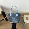 Los bolsos de moda de comercio exterior son súper populares este año, 2026 nuevo elegante bolso tote de cubo cruzado para el día a día