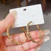 Aretes de aro de metal con circonita geométrica estilo europeo y americano para mujer, elegantes y versátiles, populares en línea, con un toque de alta gama, adecuados para ir al trabajo