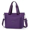Bolsa tote de nylon de grande capacidade para mulheres, novo estilo 2026, bolsa de ombro leve e à prova d'água em tecido Oxford, adequada para o dia a dia, pode ser carregada na mão ou usada na transversal