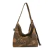 Bolsa de Lona Grande Capacidade Estampa de Leopardo Feminina 2026 Novo Estilo Coreano Ins Bolsa para Estudante Universitário Trabalho Diário Bolsa Tote Saco