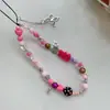 Cadena para teléfono móvil casera de nicho rosa negro estilo dulce fresco cordón ccd colgante retro para teléfono móvil dulce y picante colgante ccd