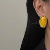 Brincos Geométricos Ovais Turquesa com Design Único e um Toque Simples e Elegante