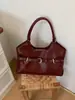 Bolso de mano casual de gran capacidad para mujer, nuevo y moderno de la primavera 2026, exquisito, de lujo ligero, para el hombro y cruzado diario