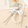 Pulsera de Cadena con Perlas de Flor de Cerezo Bicolor Estilo Coreano Ins Colgante para Teléfono Bolso Versátil de Moda Accesorio
