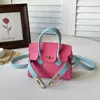 Otoño 2026 Nuevo Mini de Alto Valor Moderno Sencillo Elegante Temperamento Versátil Bolso Kelly de un Hombro Cruzado de Mano